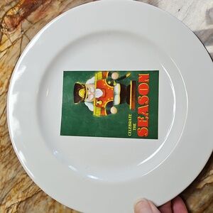 THE MARKETPLACE Festive Christmas Tree Plate says CELEBRATE THE SEASON